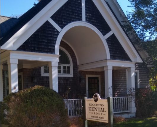 Dental Office outside photo with board